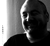 portrait picture of andrew bailey taken in black and white using nikon d90